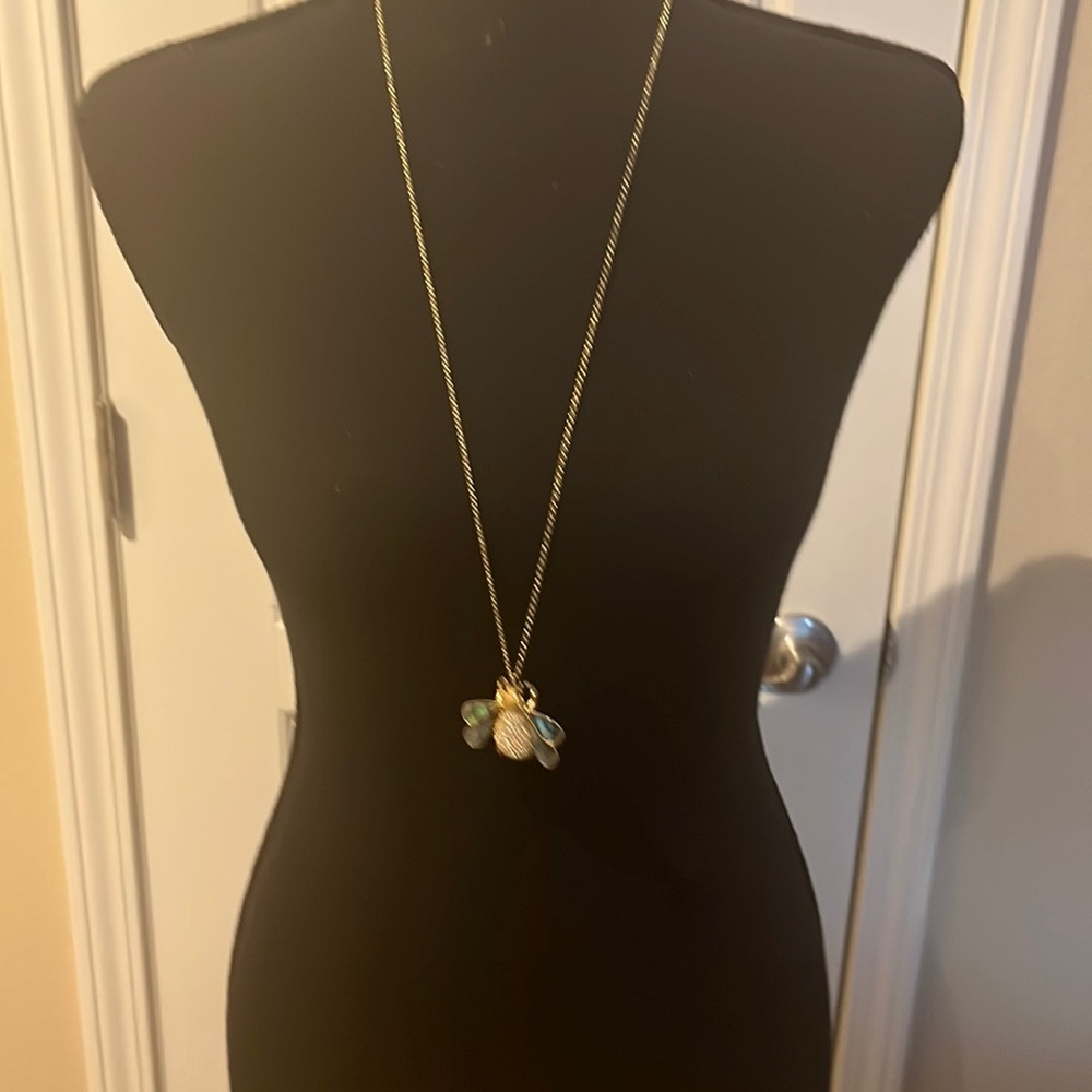 Abalone shell  and gold tone bee pendant style necklace.